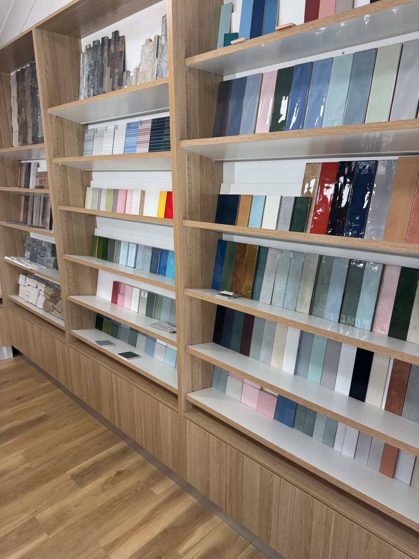 Inside the Future Tile showroom, tile samples lining the walls